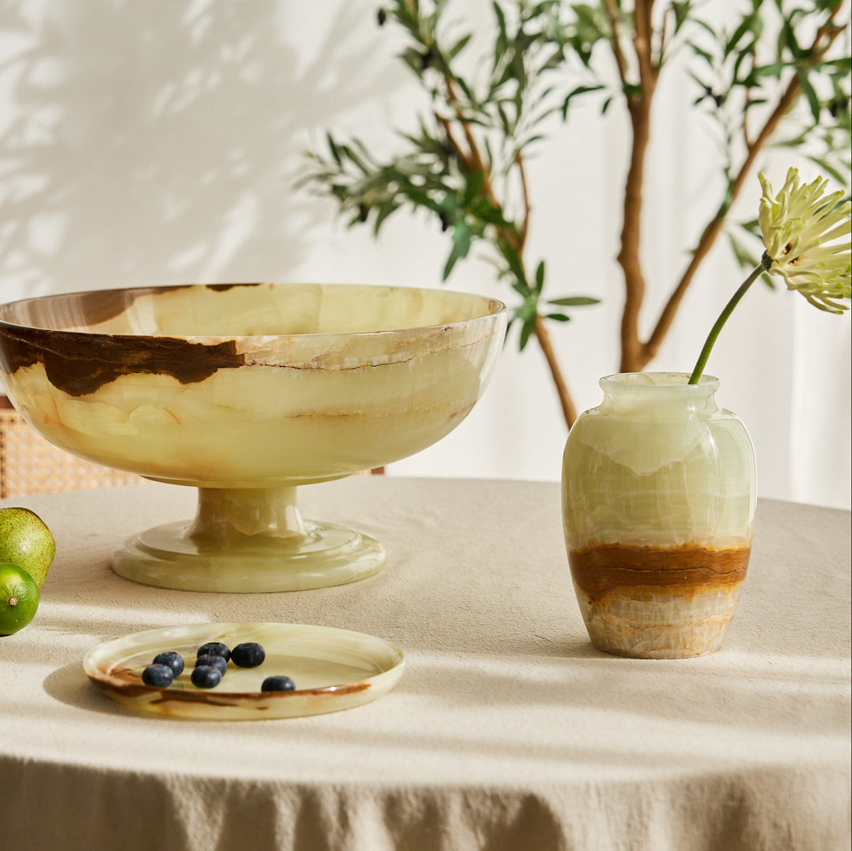 handcrafted onyx vase in ivory tones with warm amber veining for elegant decor